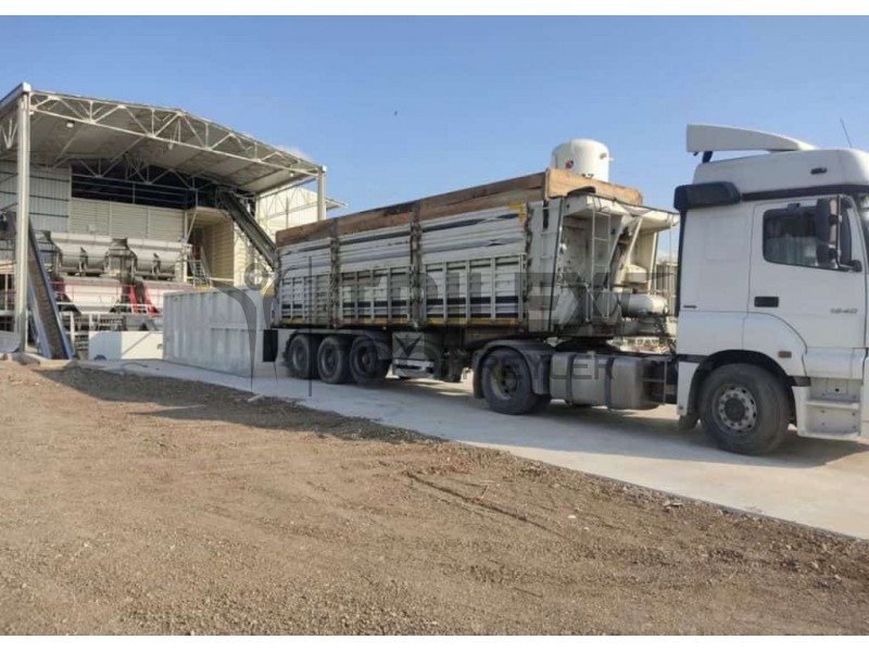 moving floor storage and conveying bin